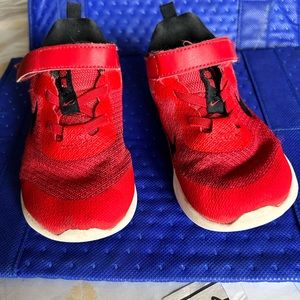 Toddler shoes, size 10. Red and white Nikes, also fairly new hardly worn.
